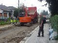 Een typerend beeld van wegenwerkers in aktie.